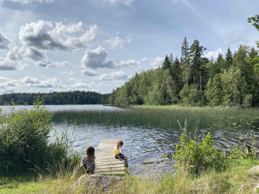 Kids by a lake in Sweden